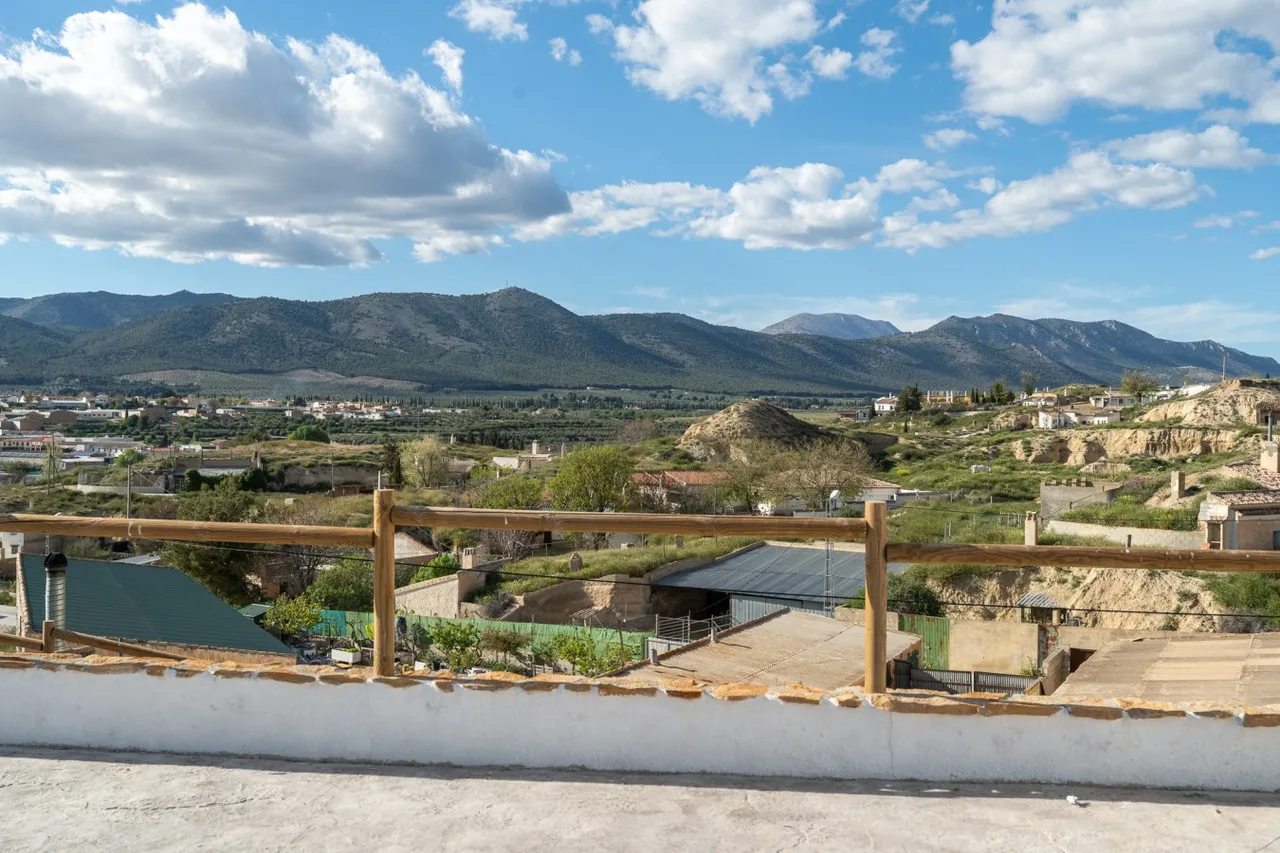 Panoramic view across the Granada Altiplano from Cueva Alba